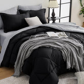 HEVUMYI queen comforter all-season on bed, cloud-soft microfiber for comfortable warmth.