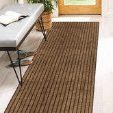 Heyroll two-by-six stripe brown rug with rubber backing for high-traffic entrances.
