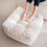 HIGOGOGO square corduroy pouf in beige offers cozy seating.