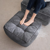 HIGOGOGO square stuffed pouf ottoman with durable dark grey corduroy fabric.
