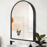 HLFMVWE arch wall mirror with a black brushed metal frame for versatile spaces