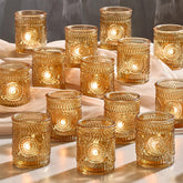 Hlukana 30-pack clear glass votive holders with sunflower emboss for elegant wedding centerpieces.