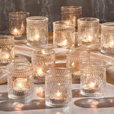 Hlukana 30-pack clear glass votive holders on a table centerpiece.