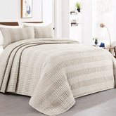 HOMBYS seersucker patchwork oversized quilt drapes floor-to-floor for a clean bed silhouette
