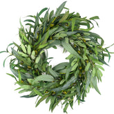 HomeKaren olive wreath on front door with lush greenery for year-round curb appeal.