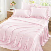 Homiest ruffled satin sheets in blush pink on bed for luxurious comfort