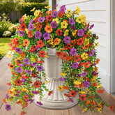 Homsunny hanging daisies with eucalyptus for durable outdoor color.