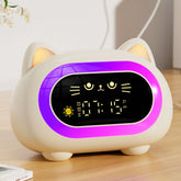 Honesorn cat-face alarm clock signals wake time with a friendly green light.