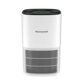 Honeywell Allergen Plus compact air purifier on a tabletop for small spaces.