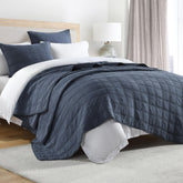 HORIMOTE HOME denim blue quilt face shows geometric pattern and breathable cotton comfort.