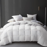 Hotel Grand Luxury White Goose Down Fiber Comforter in full-queen setup highlighting all-season warmth