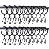 Hotop 32 mm metal drapery rings on rod for smooth curtain movement.