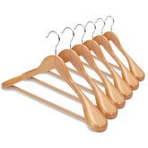 House Day wide-shoulder wooden hanger supports jackets with gentle shape.