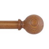 HTZON curtain rod with brown wood grain ball finials provides sturdy window coverage.
