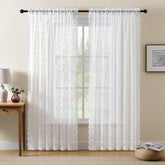 HushLoom lace curtains with branch pattern in white soften daylight while maintaining privacy.