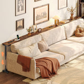 Huuger behind-couch table with power outlets keeps devices within easy reach.