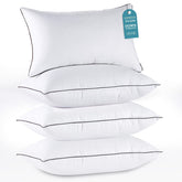 HUXMEYSON pillows on a neatly made bed for all-night plush support.