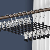 HWAJAN 14-inch black pants hangers with clips securely hold pants and save closet space.