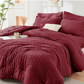 HYMOKEGE Burgundy Queen Comforter Set top view showing seersucker texture for a refined bedroom