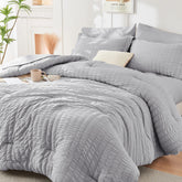 HYMOKEGE light grey king seersucker comforter set on bed for all-season comfort.