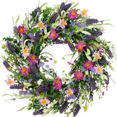Idyllic 22-inch wreath on front door with lavender-daisies for bright curb appeal.