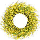 Idyllic 22-inch Forsythia wreath on front door with bright yellow blooms.