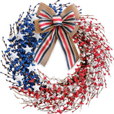 Idyllic 4th of July wreath on front door enhances curb appeal with patriotic flair.