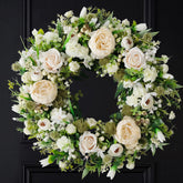 Idyllic artificial floral wreath front door featuring white peony and rose for welcoming outdoor decor.