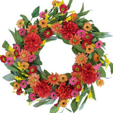 Idyllic 20-inch spring wreath for front door with colorful daisies and green leaves.