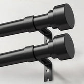 IFELS heavy-duty curtain rod 2-pack in black with durable outer profile for mounting.
