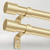IFELS 2-pack curtain rods in gold finish provide sturdy window dressing.
