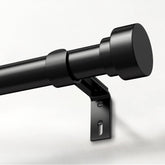 IFELS heavy-duty curtain rod with 1-inch black end design for durable style
