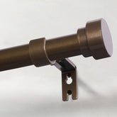 IFELS heavy-duty bronze curtain rod in angled view, supports heavy drapery with lasting strength.