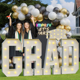 imprsv Grad 4ft light-up letters for graduation decor, creates a bold photo backdrop.