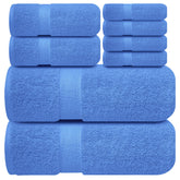 Infinitee Xclusives Eloquent Blue bath towel 27x54 shows plush absorbency after showering