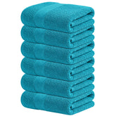 Infinitee Xclusives Teal Hand Towel close-up showing plush cotton texture for absorbent drying