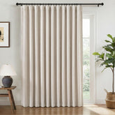 INOVADAY beige blackout curtain panel blocking daylight for a peaceful bedroom.