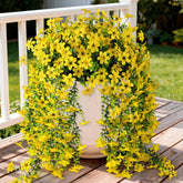 INQCMY artificial daisy with eucalyptus, 2-pack, ideal for outdoor displays.