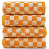 Jacquotha orange-checkered hand towels set in soft cotton for kitchen or bathroom use.