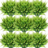 Janinka artificial Boston fern stems provide lush shelf greenery.