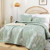 JANZAA quilt in sage green with botanical pattern for a fresh boho bedroom