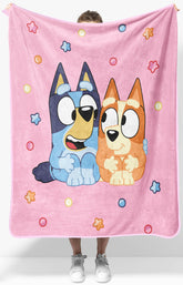 Jay Franco Bluey plush throw blanket featuring characters, perfect for cozy movie nights on the couch.