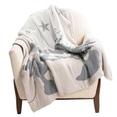 Jay Franco Mickey and Minnie feather knit throw blanket in gray stars for cozy couch snuggling.