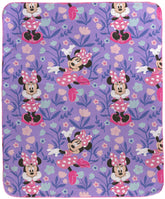 Jay Franco Minnie Mouse plush throw with pink polka dots, a cozy bed companion