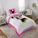 Jay Franco Minnie Mouse XOXO comforter set with a vibrant print and soft fabric.