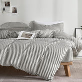 JELLYMONI striped duvet cover on a white bed, highlighting breathable cotton comfort