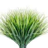 JEMONG 12 bundles artificial grasses outdoors, UV-resistant and fade-free for year-round greenery.