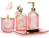 Jenseits pink glass soap dispenser for elegant bathroom organization and easy handwashing.
