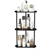 Jesginboo 3-tier organizer in black metal on bathroom counter for skincare storage.