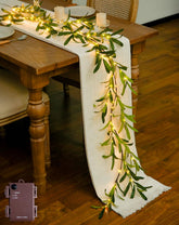 JMEXSUSS artificial olive garland with lights on a fireplace mantel for warm ambience